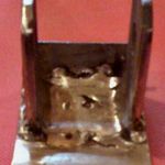 Bobble strut bracket welded to plate