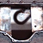 Oil pan with baffles, reinforments, and a bung